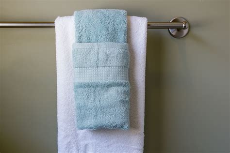 With loop for hanging for easy storage when not in use. How to Display Towels Decoratively | Bathroom towel decor ...