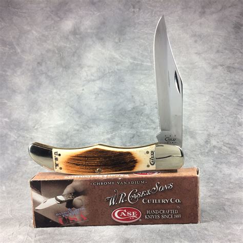 What Is A 2014 Case Xx 6165 Cv Amber Bone Hunter Folding Pocket Knife