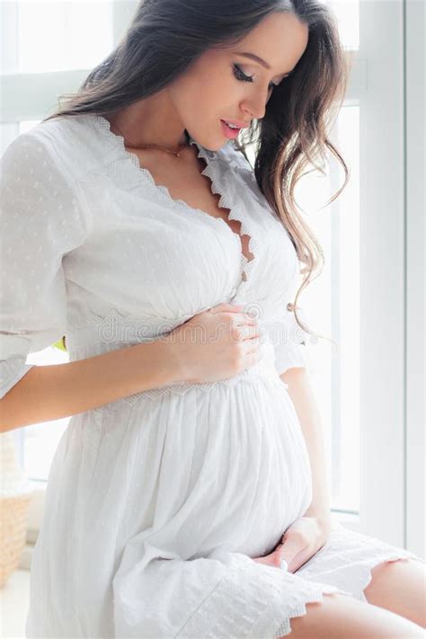 Young Beautiful Pregnant Woman In White Dress Stock Image Image Of