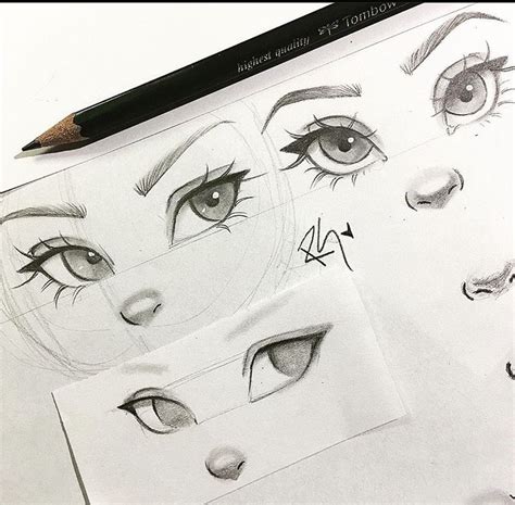 Pencil Drawings Of Eyes And Eyebrows On Top Of A Piece Of Paper With