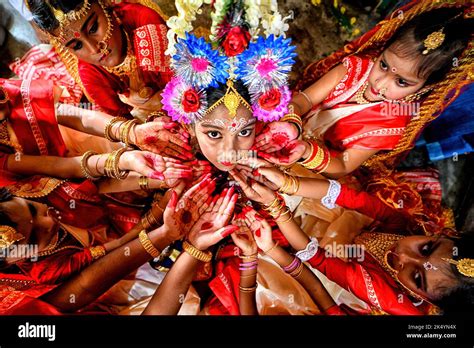 Young Girls Pose For A Photo During The Kumari Puja Ritual On The 9th
