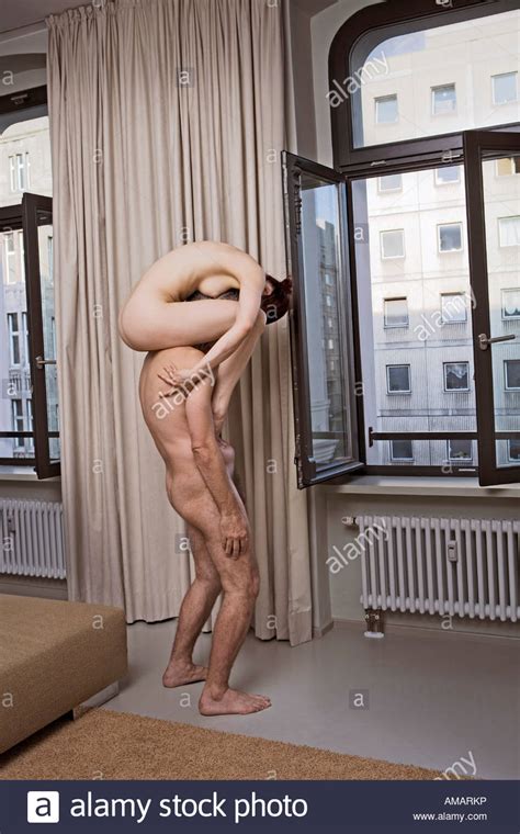 Intertwined A Naked Woman Resting On The Shoulders Of A