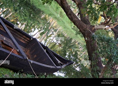 A Typical Wooden Boat Seen In The Backwaters Of Kerala Stock Photo