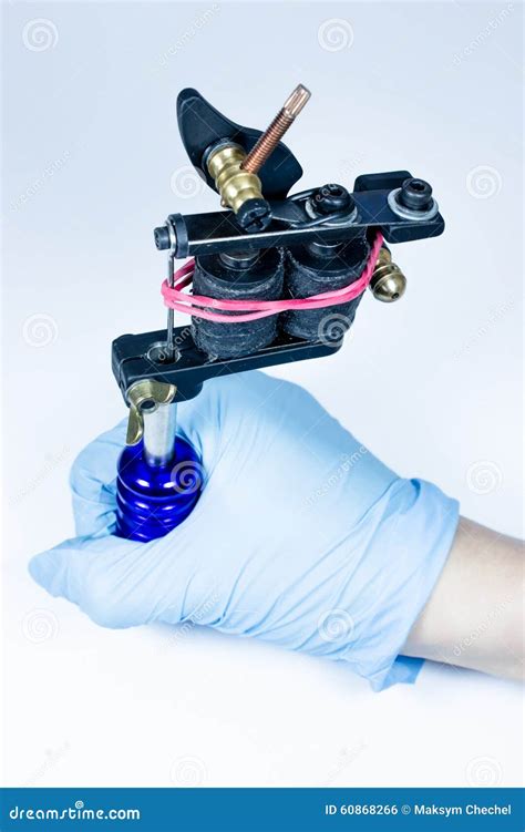 Tattoo Machine Stock Photo Image Of Client Master Hand 60868266