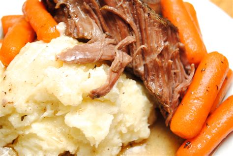 Bake covered 45 minutes longer or until the meat is tender and the potatoes and carrots are soft. Pot Roast with Mashed Potatoes and Cornbread - Biscuits 'n Crazy