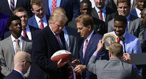 Trump Signs An Alabama Football And Drama Ensues Politico