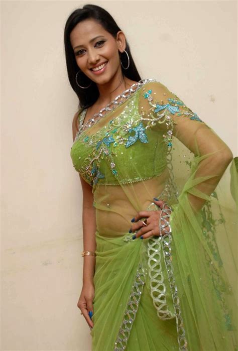 Sanjana Singh Hot Navel Photos In Transparent Saree Movie Photos