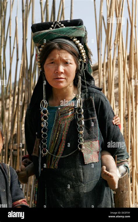 Portrait Of Ethnic Akha Woman In Tribal Village Near Phongsali Laos