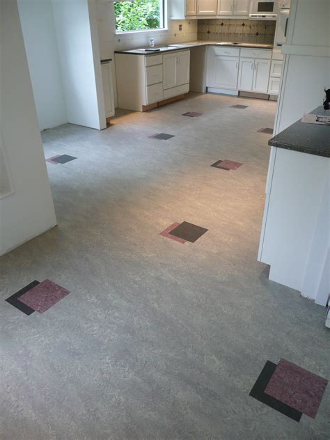 Marmoleum Kitchen Floor With Custom Accent Completed By Interior Floor