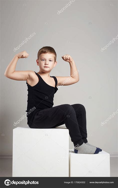 Sport Boy Showing His Muscles — Stock Photo © Eugenepartyzan 170624302