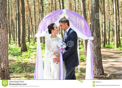 Couple Getting Married At An Outdoor Wedding Ceremony Stock Image Image Of Couple Matrimony