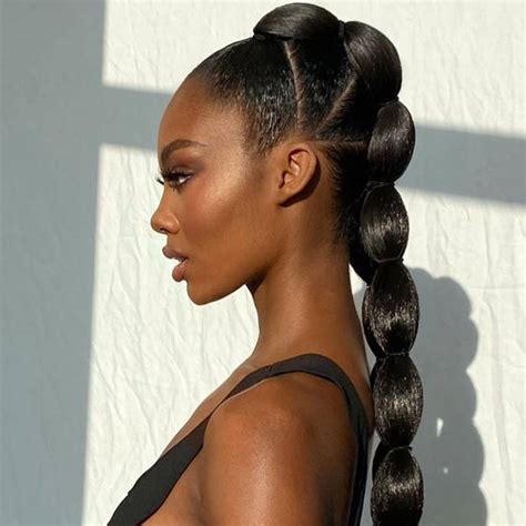 12 Ways To Wear Ponytail Braids From Tied Back Twists To Hybrid