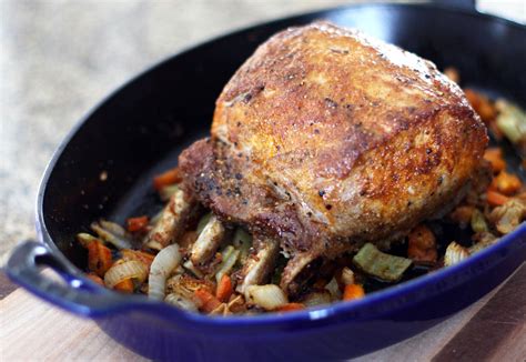 Remove from the oven and slice between. Spiced Pork Rib Roast on a Bed of Vegetables Recipe