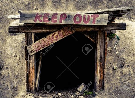 Conceptual Image Of A An Entrance To An Old Mine Tunnel With Keep Out