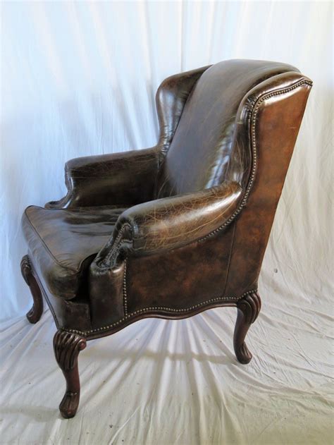 31 w wing arm chair top grain leather diamond stitched brown w saddle strap. Leather Wing Armchair | Winged armchair, Armchair ...