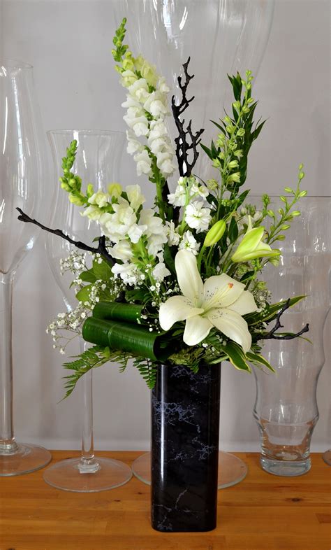 Funeral flowers add beauty, fragrance, and tribute to. Modern Tribute for a Man | Funeral floral, Funeral flower ...