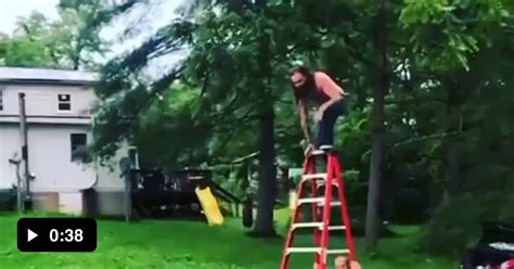 Shirtless Guy Jumps Off Step Ladder Onto Barbed Wire Trampoline And Gets His Hair Stuck 9gag