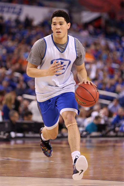 Devin booker is a professional american basketball player who plays for the 'national basketball association' (nba) team 'phoenix suns.' he was born to famous basketball player melvin booker. Devin Booker - Devin Booker Photos - NCAA Men's Final Four ...