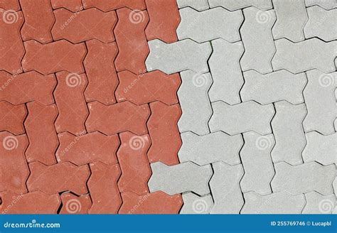 Red And Gray Interlocking Concrete Paver Blocks Irregular Shaped Tiles