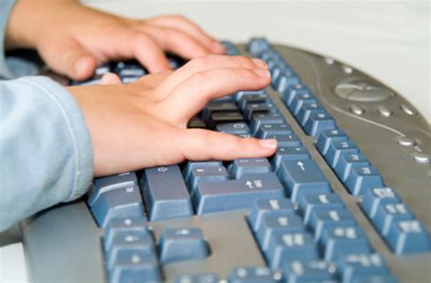 Child Typing On Computer Keyboard Stock Photo Download Image Now Istock