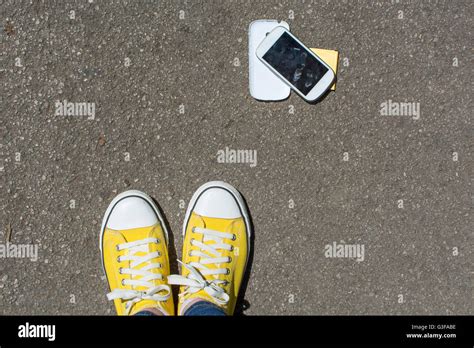 Cellphone Smartphone Drop On Ground Hi Res Stock Photography And Images