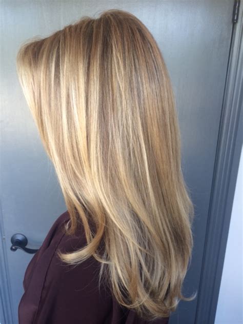 Blonde hair naturally reacts with sunlight and ultraviolet radiation to create subtle shades of color, from brown tones to nearly white hues. blonde hair color - JONATHAN & GEORGE