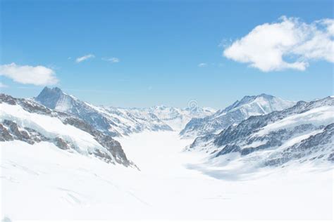 Snow Capped Swiss Alps Mountain At Jungfrau Switzerland Stock Image