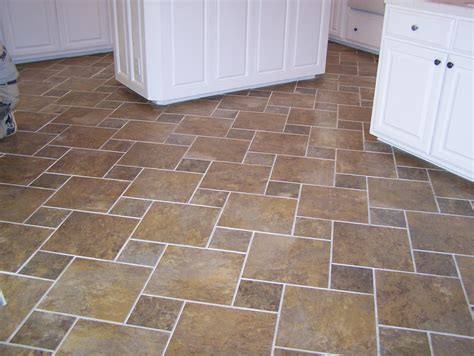 Steve maps out the floor and finds that a staggered layout works well because it avoids thin, small tiles around the perimeter. Tile and Wood Floor Layouts | Discount Flooring Blog