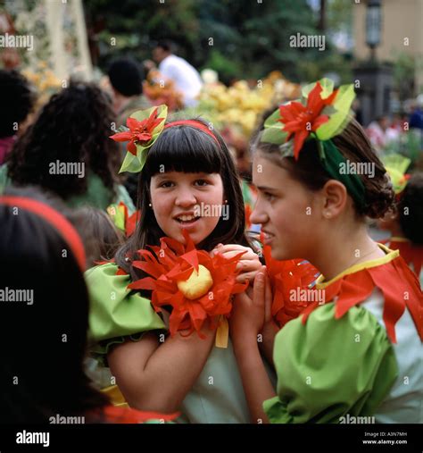 Two Girls With Green And Red Costume At Spring Flower Festival Funchal