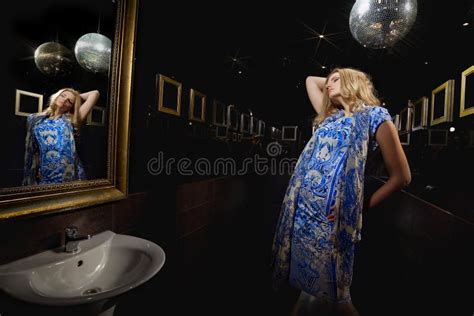 Blonde Woman In Front Of Mirror Stock Image Image Of Head Beauty