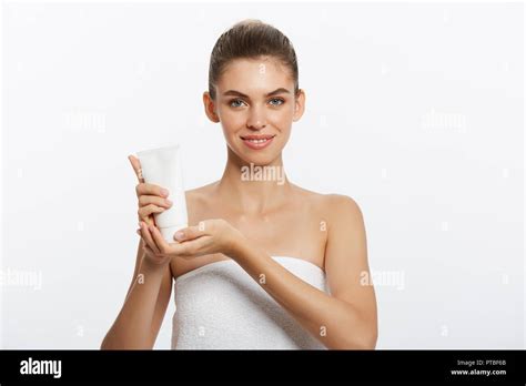 Beauty Youth Skin Care Concept Beautiful Caucasian Woman Face Portrait Holding And Presenting