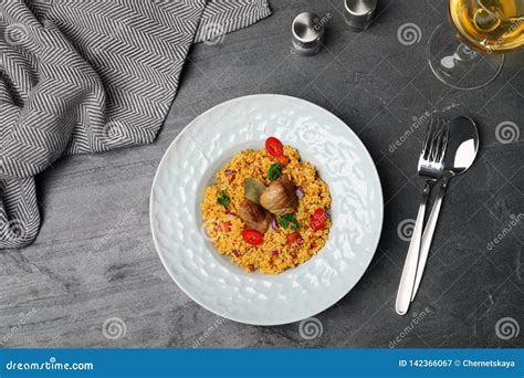 Plate With Rice Pilaf And Meat On Grey Background Stock Image Image