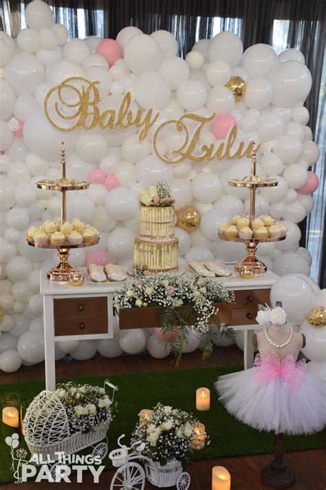 Keep it simple by asking baby shower guests to bring only diaper here are 14 creative baby shower diaper gifts and decorations that you can make yourself — and many are available for purchase, too. Balloon Wall Backdrop for a Baby Shower | Baby shower ...