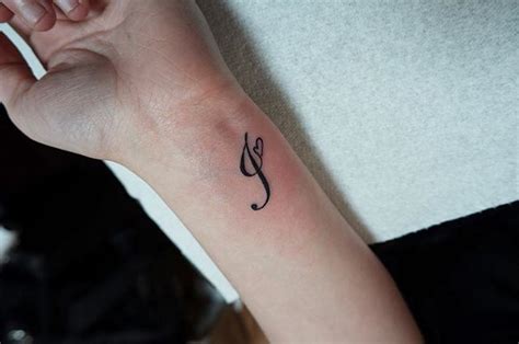 For girls the best area to get an initial tattoo is on their wrist. Slide 57 of 107 | Initial tattoo, J tattoo, Tattoo lettering