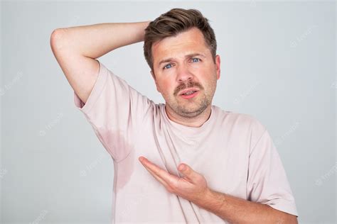 Premium Photo Man With Hyperhidrosis Sweating Very Badly Under Armpit