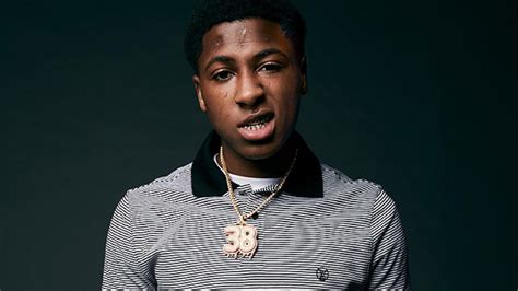 Nba Youngboy Is Wearing Black White Striped T Shirt In