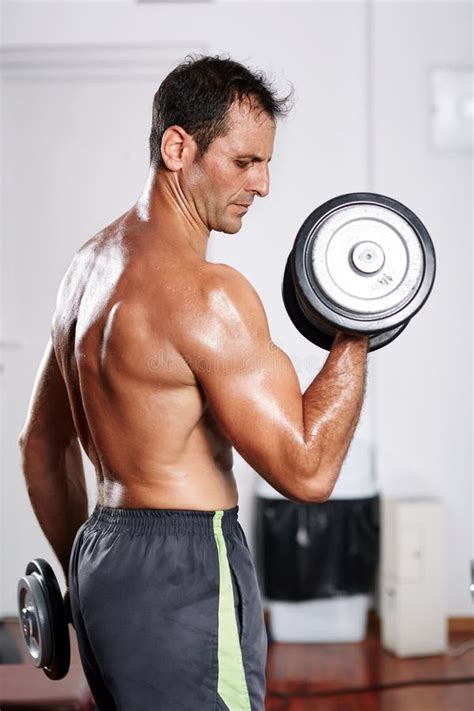 Man Doing Biceps Curl In Gym Stock Image Image Of Biceps Lift
