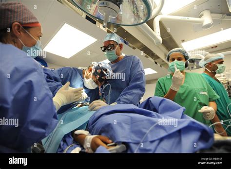Volunteer Medical Staff With The Smile Train Perform Cleft Palate Surgery On An Iraqi Boy At