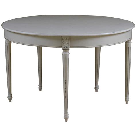 When it comes to dining rooms, gray is a tone that can either take the spotlight or act as an accent color to more powerful hues, depending on the shade. Louis French Light Grey Folding Round Dining Table | White Painted Dining Tables | French Furniture