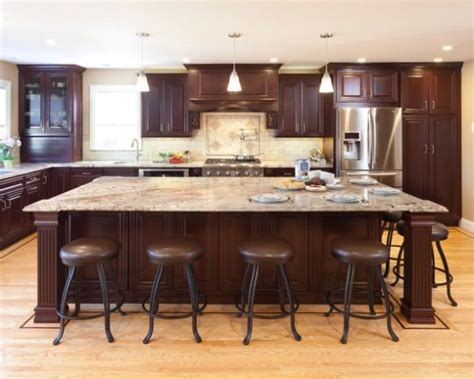 Maybe you would like to learn more about one of these? Rich cherry cabinets, blonde hardwood floors, large island ...