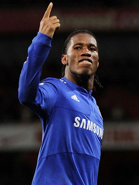 A report that didier drogba has retired from playing to rejoin chelsea as assistant to guus hiddink is premature, it is understood. Football Home: Didier Drogba