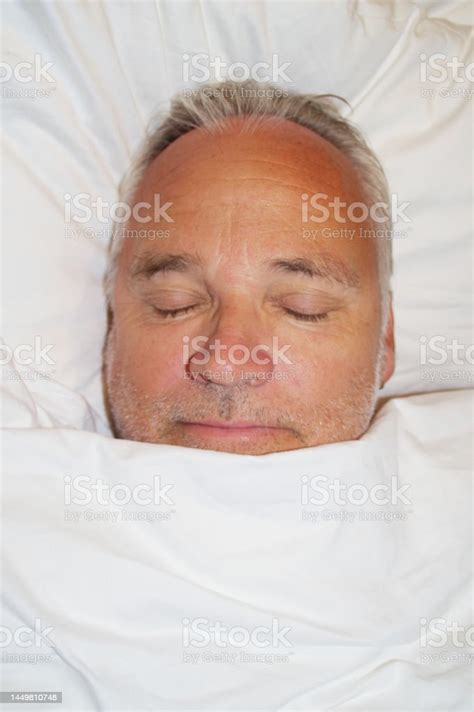 Man Sleeping In White Sheets Stock Photo Download Image Now People