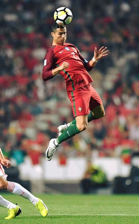 Ronaldo Of Portugal Flying In The Air To Head The Soccer Ball
