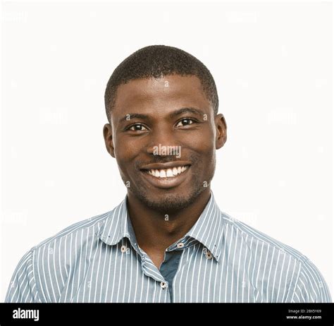 Toothy Smiling African American Man In Shirt On White Background