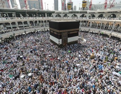 Muslim Pilgrims Circle The Kaaba The Cubic Building At The Grand