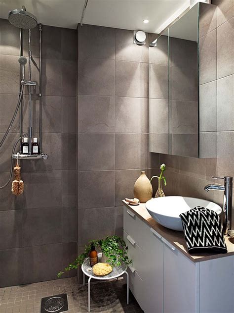 The grey bathroom tile scheme evokes sea passages and nautical getaways, at once handsome and simple to implement into your design scope. Ideas For The Small Shower Room