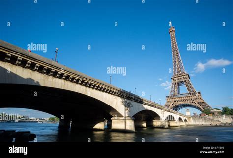 The Eiffel Tower And Bridge Over Seine River In Paris Stock Photo Alamy