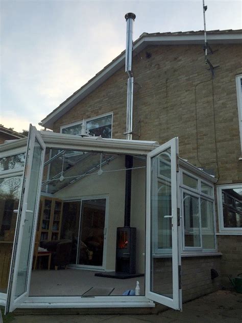 Image Showing An External Flue Into A Conservatory Stove Installation