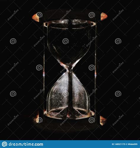 Stock Photo Of A Dark Sand Hourglass Stock Image Image Of Sand