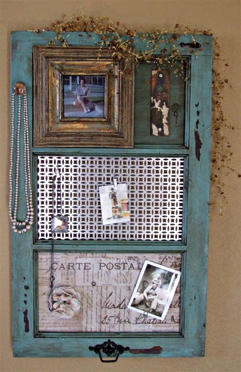 Hang photos as many as you want with this photo frame! DIY Vintage Window Frame Organizer | FaveCrafts.com